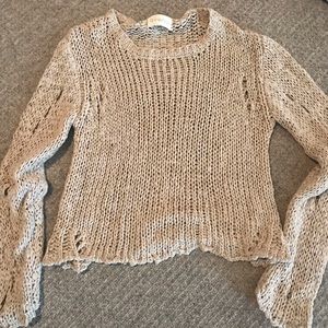 Cropped distressed sweater